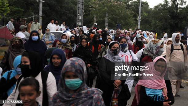 Afghan nationals who fled to Pakistan from Afghanistan after Taliban took over Afghanistan last year hold a protest.. The Afghan protesters demanded...