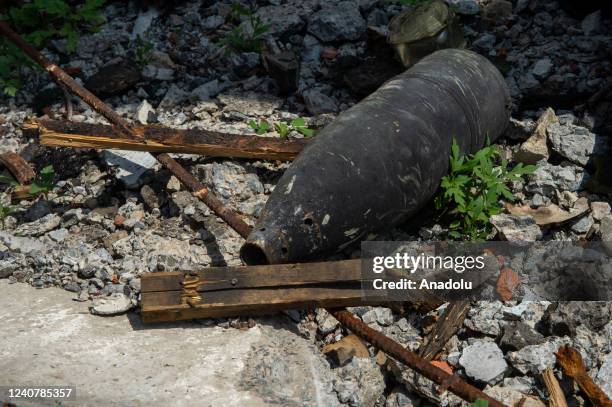 Military ammunition left over from the clashes is seen on the road in the village of Biskvitne, Kharkiv region, Ukraine on May 19, 2022.