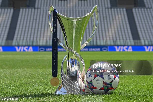 The UEFA Women's Champions League Trophy, Winners Medal and Official Match ball at Juventus Stadium on May 20, 2022 in Turin, Italy. FC Barcelona...