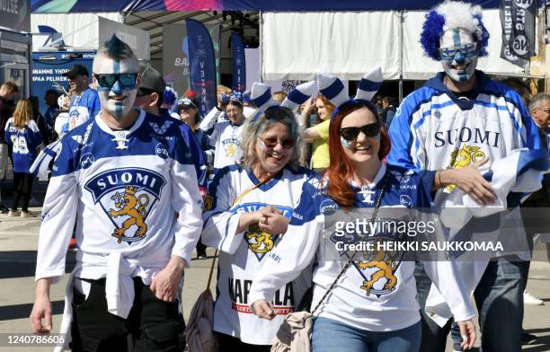 Finnish hockey fans arrive for the IIHF Ice Hockey World Championships 1st round Group B match between Great Britain and Finland in Tampere, Finland,...