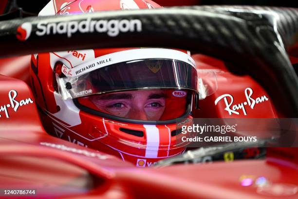Ferrari's Monegasque driver Charles Leclerc gets ready prior to the first practice session at the Circuit de Catalunya on May 20, 2022 in Montmelo on...