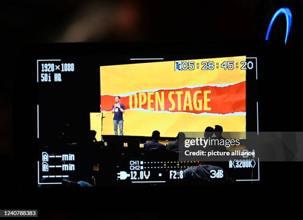 May 2022, Bavaria, Munich: The view through the viewfinder of a TV camera shows the lettering "Open Stage" on the stage of the "Blackbox" during the...