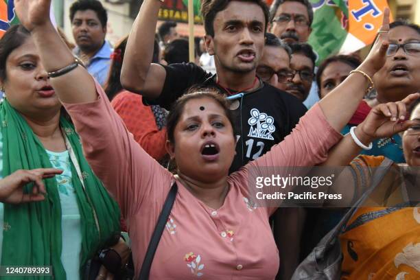 All India Trinamool Congress supporters shouting slogans during a mass gathering in support of eleven years completion of AITMC Government in West...
