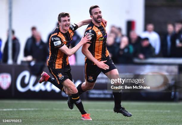 Derry , United Kingdom - 20 May 2022; Robbie Benson of Dundalk celebrates with teammate Daniel Kelly, left, after scoring his side's first goal...