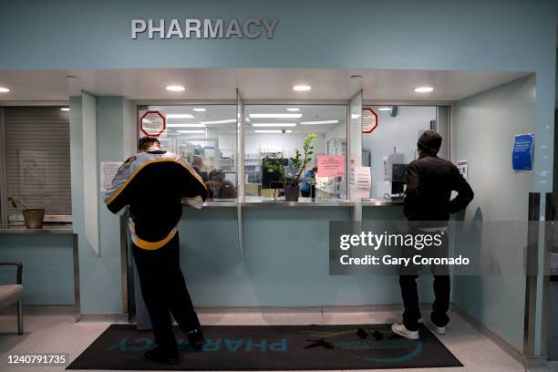 People wait for their treatment at the Downtown Eastside Connections Clinic, which offers rapid access to oral opioid agonist treatments, methadone...