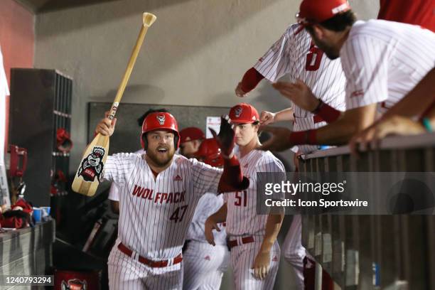 North Carolina State Wolfpack infielder Tommy White is given the oar after hitting a home run during the first game of the series between the Wake...