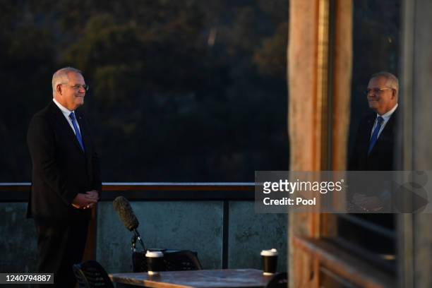 Prime Minister Scott Morrison conducts morning television interviews on Federal Election day, in the seat of McEwen on May 21, 2022 in Melbourne,...
