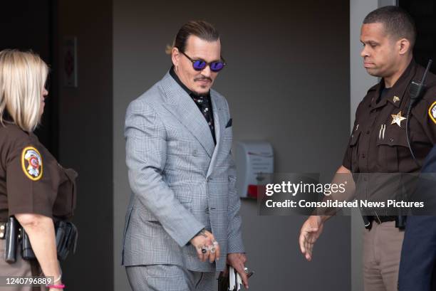 Johnny Depp is seen outside court during the Johnny Depp and Amber Heard civil trial at Fairfax County Circuit Court on May 19, 2022 in Fairfax,...