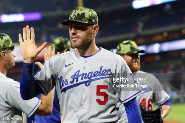 Freddie Freeman of the Los Angeles Dodgers celebrates with teammates after defeating the Philadelphia Phillies at Citizens Bank Park on Friday, May...