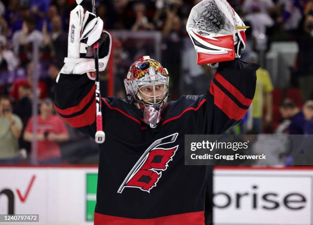 Goaltender Antti Raanta of the Carolina Hurricanes participates in a Storm Surge celebration following a 2-0 shutout victory in Game Two of the...