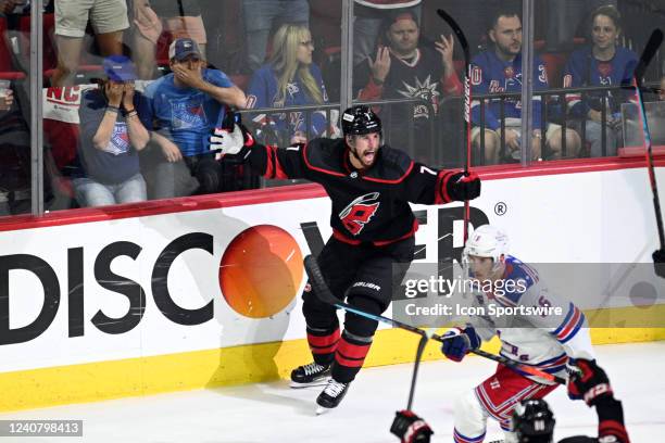 Carolina Hurricanes Defenceman Brendan Smith celebrates scoring a goal as New York Rangers fans watch during game 2 of the second round of the...