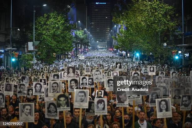 It is estimated that this year more than 150,000 people marched with photos of some of the workers or students killed during the last dictatorship...