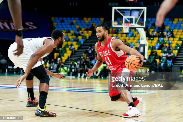 Terrel De Von of the AS Salé dribbles the ball during the game against the Clube Atlético Petroleos de Luanda on May 21, 2022 at the Hassan Mostafa...