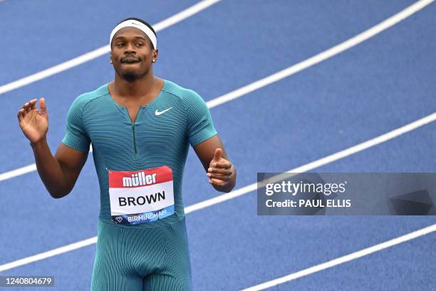 Canada's Aaron Brown celebrates after winning the Men's 100m during the IAAF Diamond League athletics Birmingham meeting at the Alexander Stadium,...