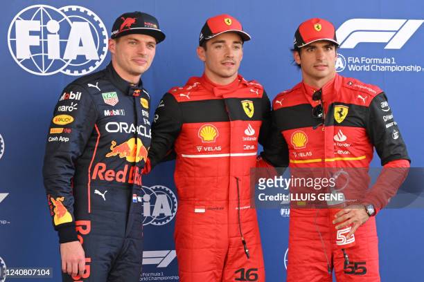 Red Bull's Dutch driver Max Verstappen, Ferrari's Monegasque driver Charles Leclerc and Ferrari's Spanish driver Carlos Sainz Jr pose after the...