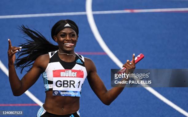 Britain's Daryll Neita celebrates as she crosses the finish line to win with her team the Women's 4x100m during the IAAF Diamond League athletics...