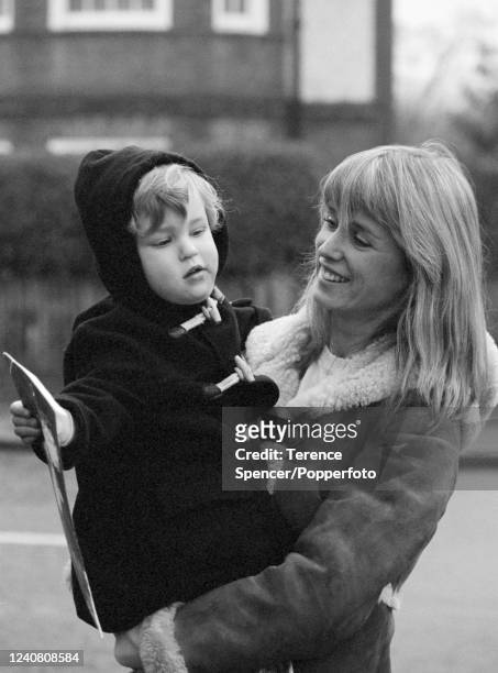 Anglo-American actress Jill Townsend with her son Luke, in London, circa December 1975.