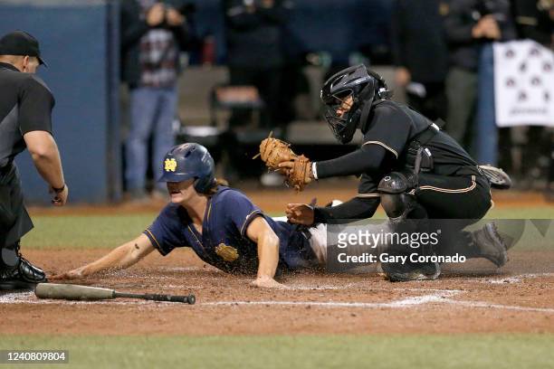 Jack Gurevitch , of Notre Dame is tagged out at home by JSerra Catholic catcher Brandon Chang in the top of the sixth inning in the Southern Section...