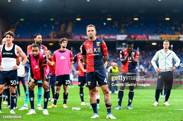 Domenico Criscito of Genoa and his team-mates stand in front of fans after the Serie A match between Genoa CFC and Bologna Fc at Stadio Luigi...