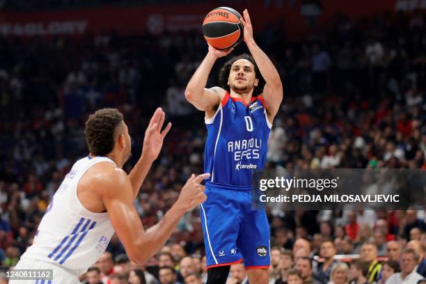 Anadolu Efes' Shane Larkin shoots the ball over Real Madrid's Walter Tavares during the EuroLeague Final Four final basketball match between Real...