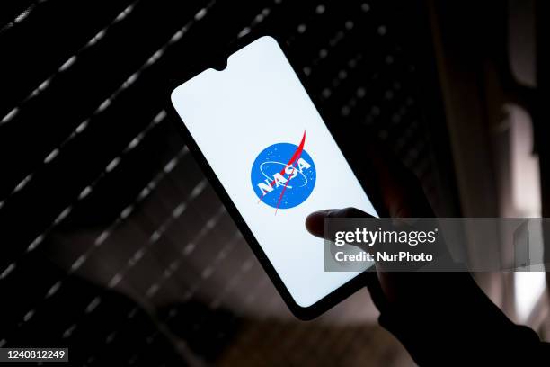 In this photo illustration a NASA logo seen displayed on a smartphone screen in Athens, Greece on May 21, 2022.