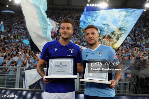 Sergej Milinkovic Savic and Ciro Immobile pose with the SS Lazio fans award before the Serie A match between SS Lazio and Hellas Verona FC at Stadio...