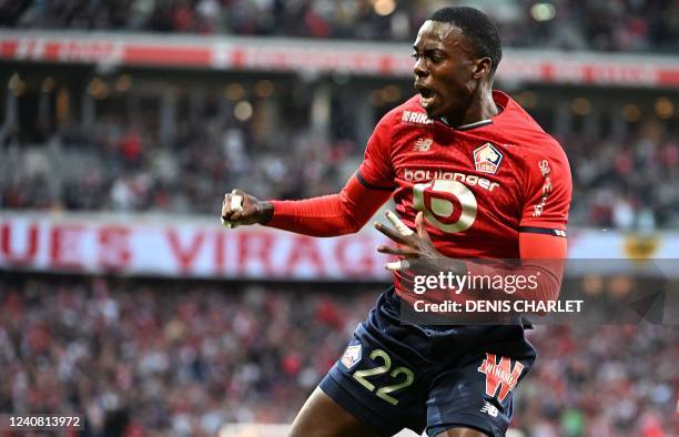 Lille's forward Timothy Weah celebrates after scoring a first goal during the French L1 football match between Lille OSC and Stade Rennais at Stade...