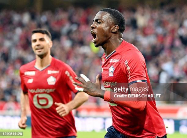 Lille's forward Timothy Weah celebrates after scoring a first goal during the French L1 football match between Lille OSC and Stade Rennais at Stade...