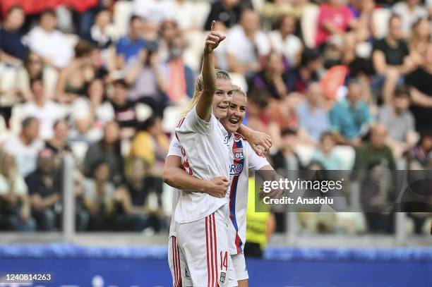 Ada Hegerberg , of Olympique Lyonnais, celebrates with her teammate Lindsey Horan after scoring during the Women Champions League football match...
