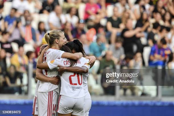 Ada Hegerberg , of Olympique Lyonnais, celebrates with her teammates after scoring during the Women Champions League football match between Barcelona...