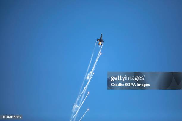 Soloturk demonstration team perform acrobatic movements in the sky. The Turkish Air Force flew with SOLOTURK F-16 warplanes as part of the "Young...