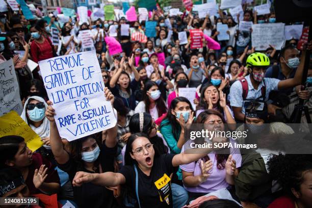 Youth holds a placard expressing her opinion during the protest. Hundreds of youths gathered near the prime minister's office and participated in the...