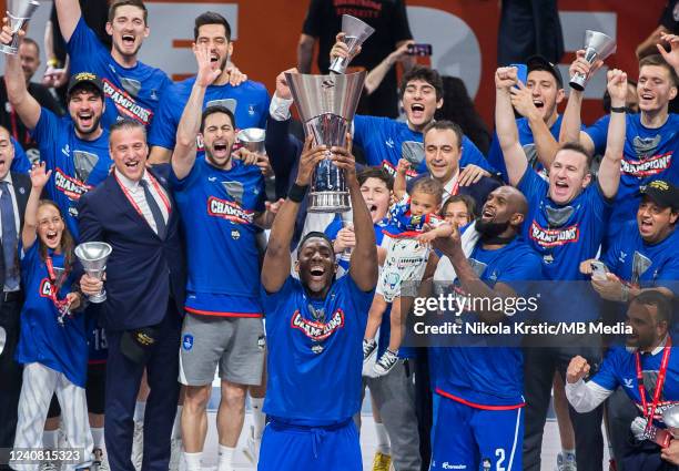 Bryant Dunston of Anadolu Efes Istanbul holds the trophy and celebrates with his teammates during the 2022 Turkish Airlines EuroLeague Final Four...