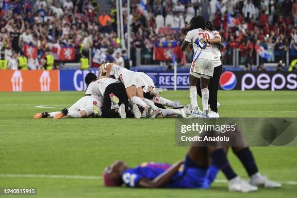 Olympique Lyonnais players celebrate at the end of their Women Champions League football match against Barcelona at Juventus Stadium in Turin, Italy,...