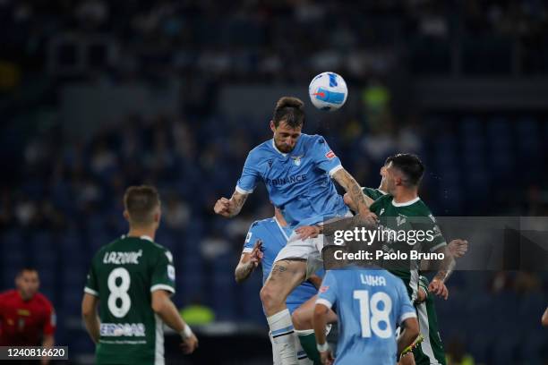 Francesco Acerbi of SS Lazio competes for the ball with Panagiotis Retsos of Hellas Verona during the Serie A match between SS Lazio and Hellas...