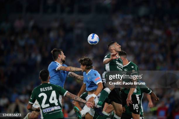 Francesco Acerbi of SS Lazio competes for the ball with Panagiotis Retsos of Hellas Verona during the Serie A match between SS Lazio and Hellas...