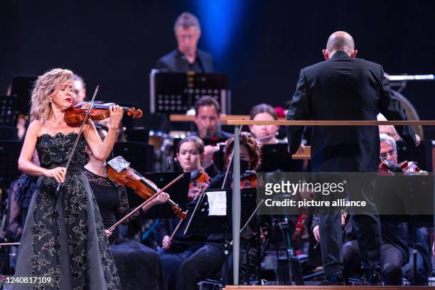 May 2022, Mecklenburg-Western Pomerania, Peenemünde: The New York Philharmonic Orchestra, led by conductor Jaap van Zweden , performs together with...