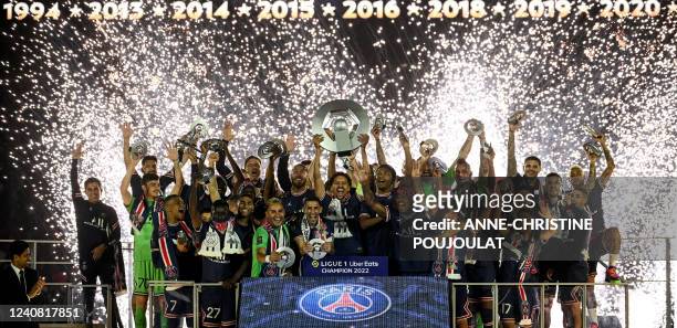 S players celebrates their club's tenth Ligue 1 title during the 2021-2022 Ligue 1 championship trophy ceremony following the French L1 football...