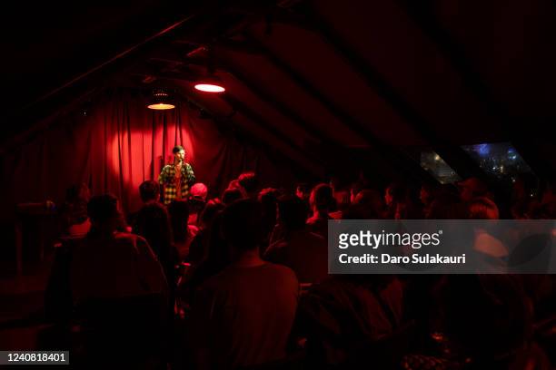 Aleksandr Dolgopolov, Russian stand-up comedian in Koshini bar on a fundraising event for Ukraine, Dolgopolov fled Russia in a fear for his safety,...
