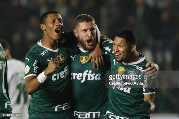 Rafael of Palmeiras celebrates with teammates after scoring the first goal of his team during the match between Juventude and Palmeiras as part of...