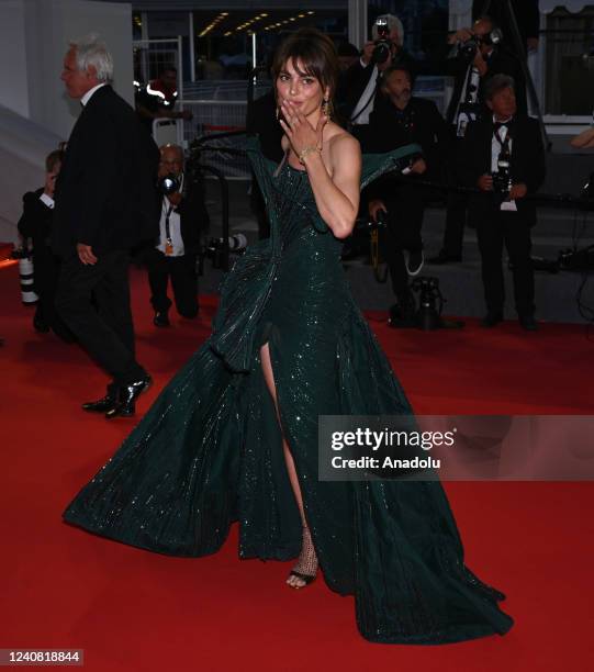 Romanian model Catrinel Marlon arrives for the screening of the film âR.M.Nâ at the 75th annual Cannes Film Festival in Cannes, France on May 21,...