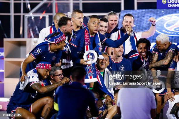 Kylian Mbappe of Paris Saint Germain celebrating with 2022 Ligue 1 winners trophy during the Ligue 1 Uber Eats match between Paris Saint Germain and...