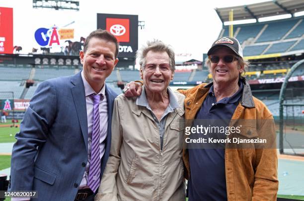 Actor Ryan O'Neal poses with his son Patrick O'Neal , Los Angeles Angels television play-by-play announcer, and actor director Hart Bochner prior to...