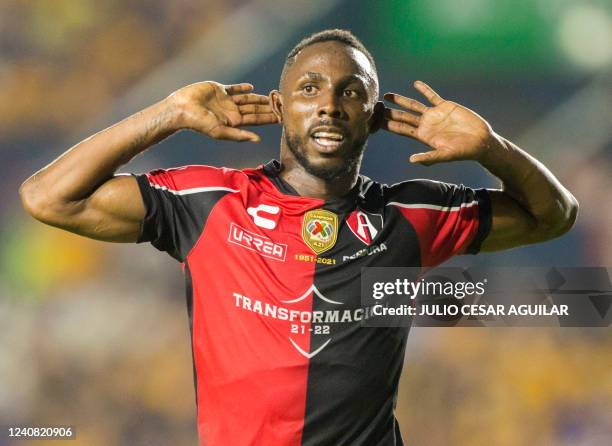 Atlas' Julian Quinones celebrates after scoring against Tigres during their Mexican Clausura 2022 tournament football, in Universitario stadium in...