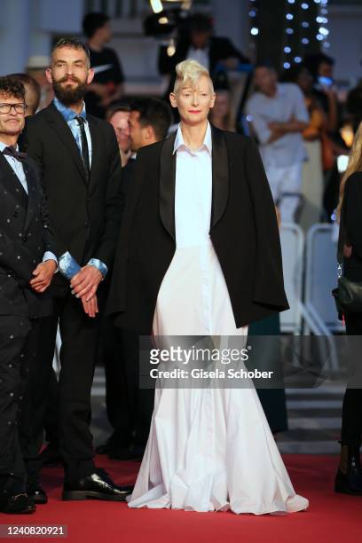 Tilda Swinton and her partner Sandro Kopp attend the screening of "R.M.N" during the 75th annual Cannes film festival at Palais des Festivals on May...