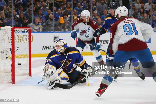 Nazem Kadri of the Colorado Avalanche scores a goal against Ville Husso of the St. Louis Blues in the second period during Game Three of the Second...
