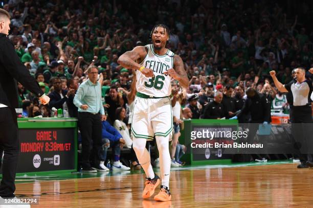Marcus Smart of the Boston Celtics celebrates during Game 3 of the 2022 NBA Playoffs Eastern Conference Finals on May 21, 2022 at the TD Garden in...