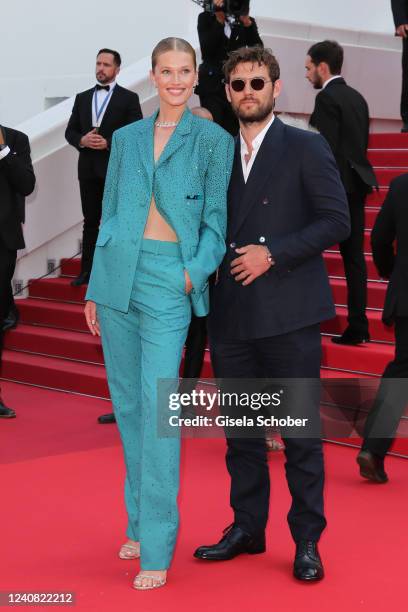 Toni Garrn and Alex Pettyfer attend the screening of "Triangle Of Sadness" during the 75th annual Cannes film festival at Palais des Festivals on May...