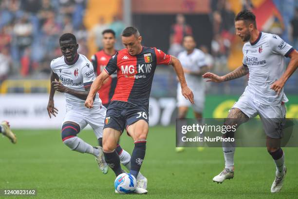 Wisdom Amey - Silvan Hefti - Mitchell Dijks during the italian soccer Serie A match Genoa CFC vs Bologna FC on May 21, 2022 at the Luigi Ferraris...