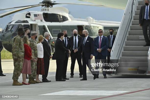 President Joe Biden is welcoming by Japanâs Minister of Foreign Affairs Yoshimasa Hayashi upon arriving at Yokota air Base in Tokyo, Japan, on May...